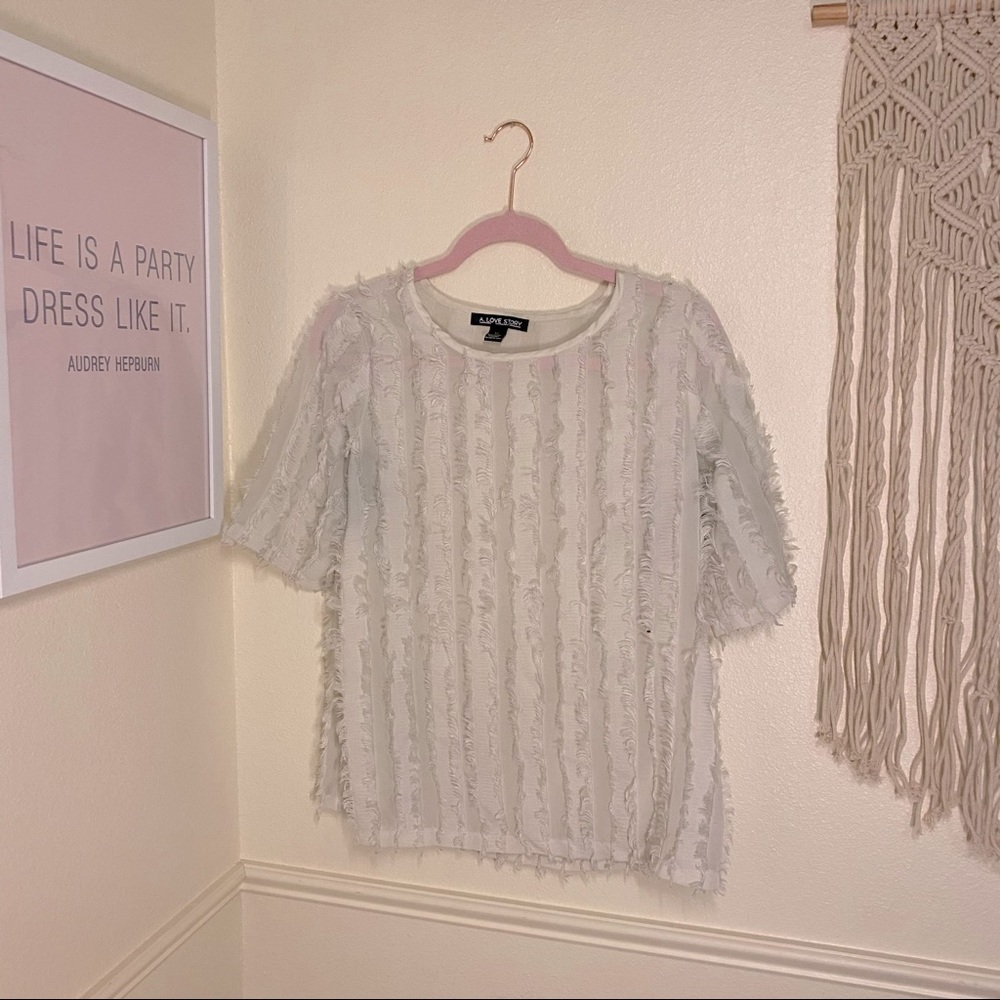 Feathered top